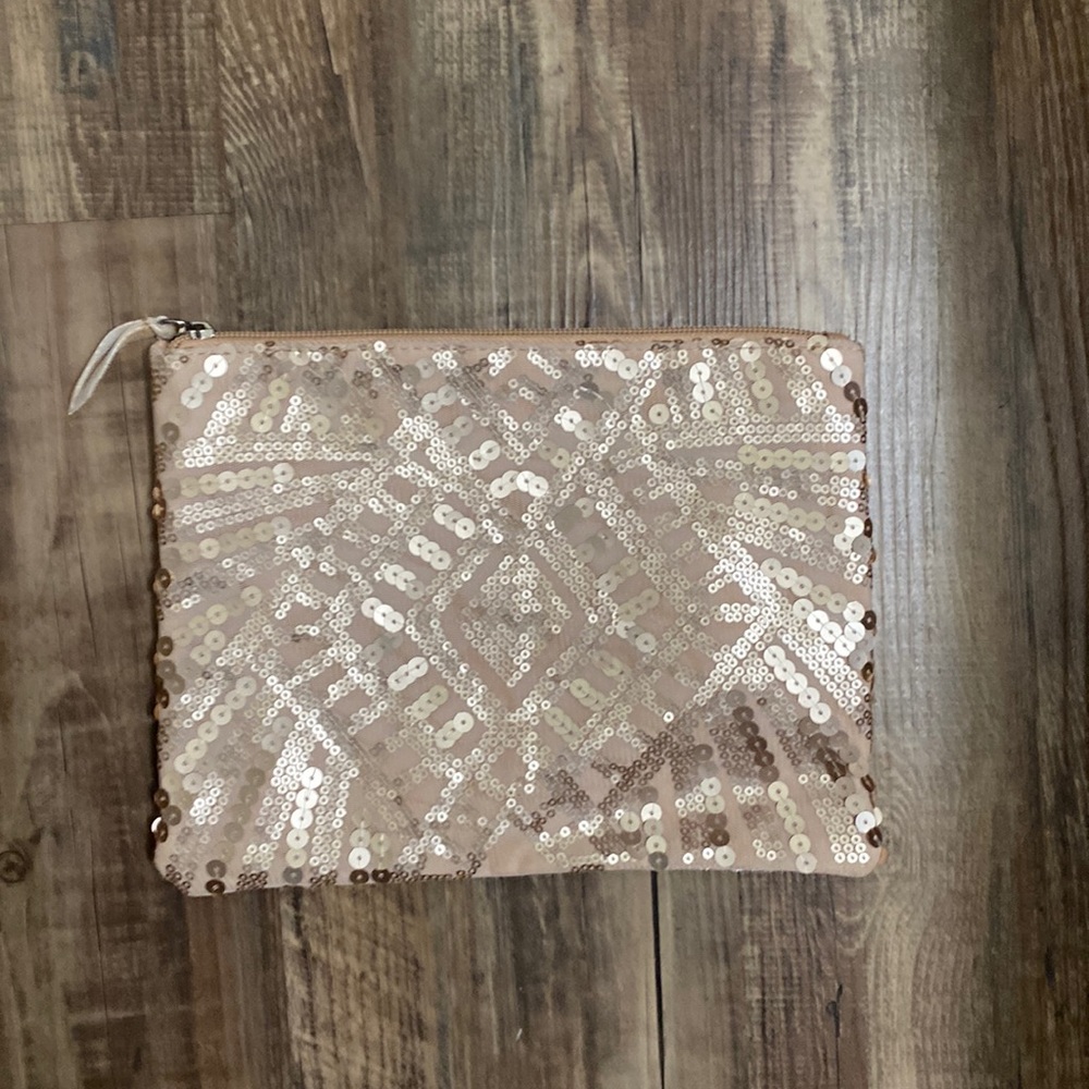 Sequined art deco makeup bag with satin lining and velvet zipper pull